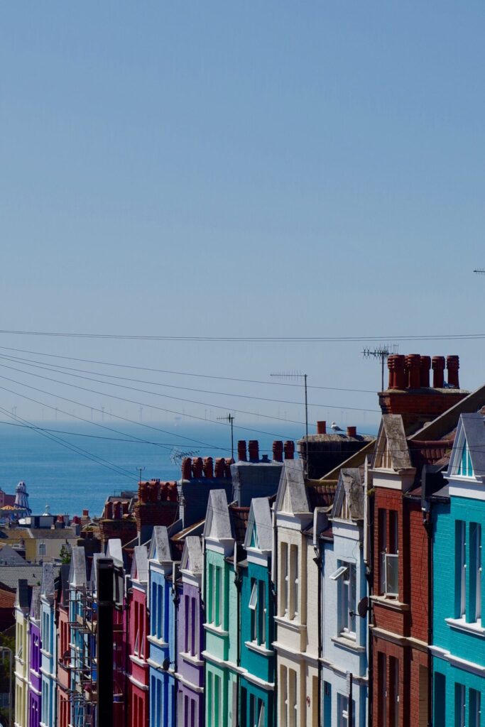Street with colourful houses with view of the sea